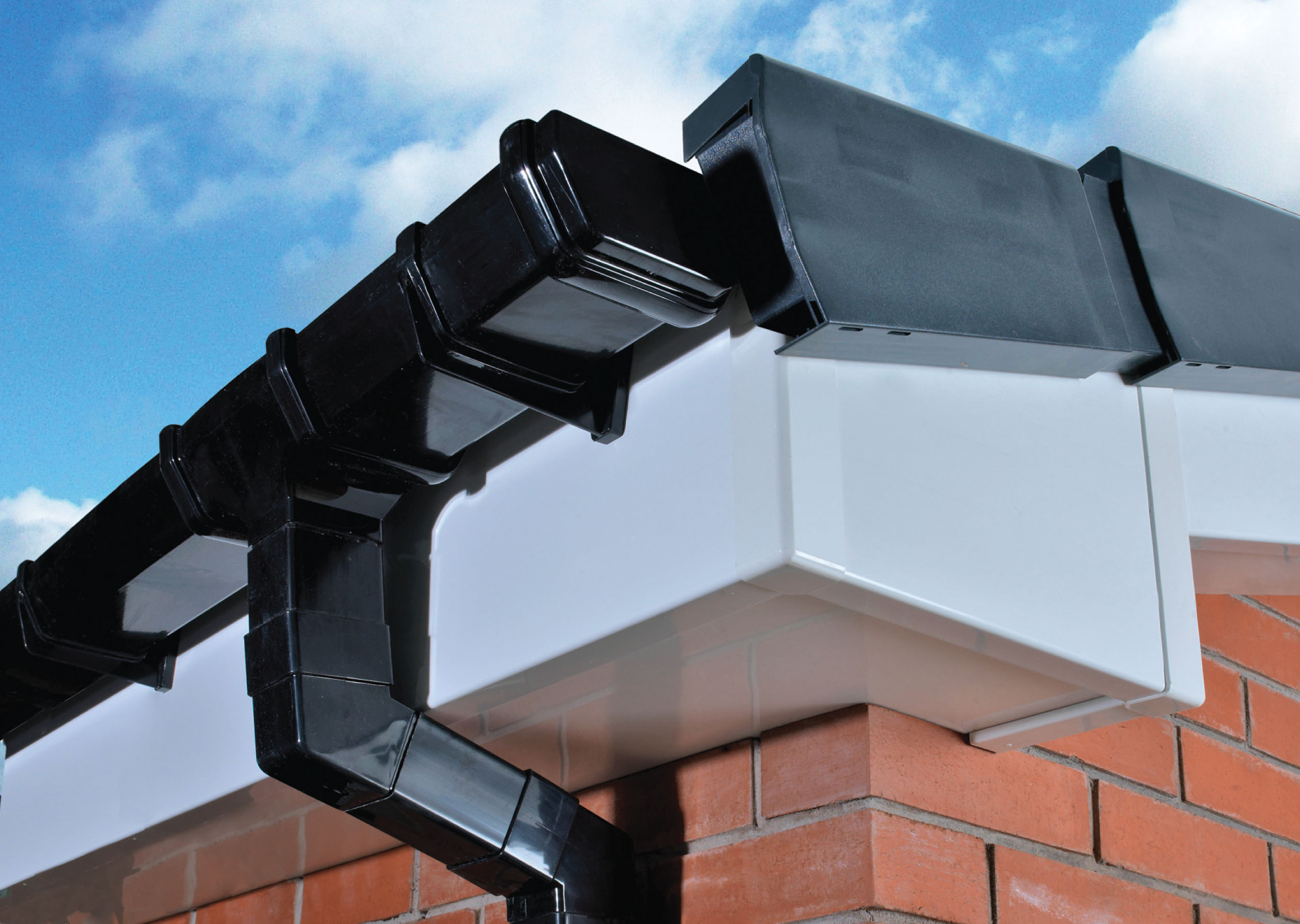white fascias with black gutters
